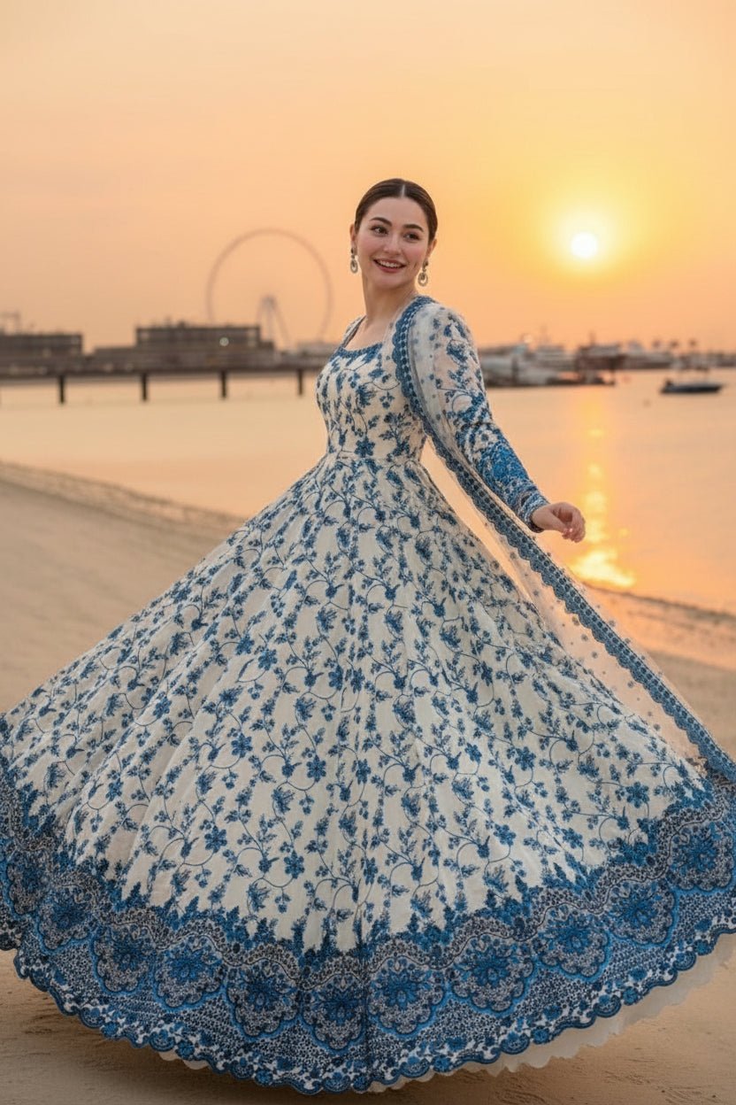 Faiza Saqlain Replica ivory floral embroidered gown twirl pose